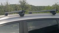 Багажник на крышу Kia Sportage III (SL) с интегрированными рейлингами, Атлант, аэродинамические дуги