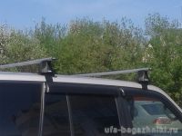 Багажник на крышу Hyundai Tucson без рейлингов, Атлант, аэродинамические дуги