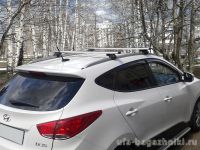 Багажник на крышу Hyundai ix35 с интегрированными рейлингами, Атлант, аэродинамические дуги