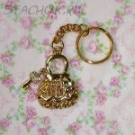 Брелок "Сумочка с секретом" под золото/стразы