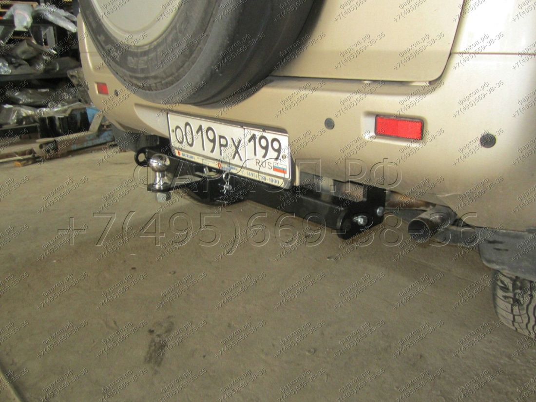 Фаркоп Suzuki Grand Vitara 3 двери 2005-2015 без подрезки бампера. Тип шара: E (легкосъемный шар под квадрат). Нагрузки: 2500/120 кг.