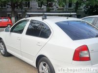 Багажник на крышу Skoda Octavia A5, Атлант, аэродинамические дуги, опора Е