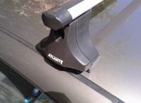 Багажник на крышу Nissan Almera Classic, Атлант, аэродинамические дуги "Эконом"