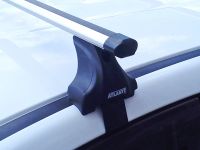 Багажник на крышу Nissan Teana L33, Атлант, аэродинамические дуги Эконом, опора Е