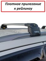 Багажник на крышу Toyota Fortuner II 2015-2024, Turtle Air 2, аэродинамические дуги на интегрированные рейлинги (серебристый цвет)