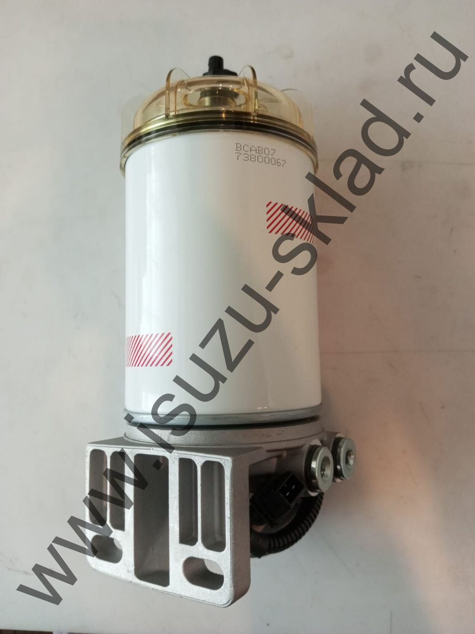 Фильтр топливный в сборе с насосом подкачки npr75/nmr85/nqr90 с подогревом Фильтр топливный в сборе с насосом подкачки npr75/nmr85/nqr90 с подогревом