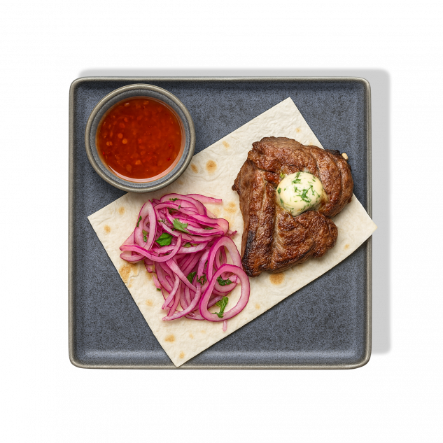 Стейк из свиной шейки с маринованным луком