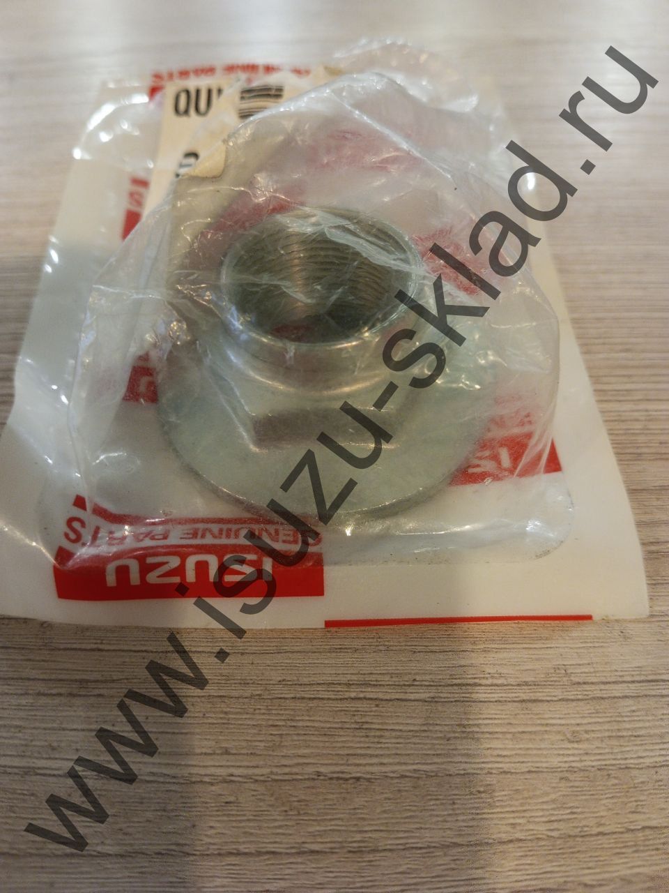 Гайка хвостовика кпп nqr71/75/90/npr75/nlr85/nmr85 (Isuzu)