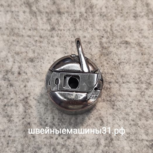 Шпульный колпачок (левый) для машин Подольск, Чайка и др. Диаметр 22,7 мм; высота 15,4 мм; отверстие под иглу 6,9 мм.      Цена 300 руб.