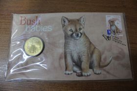Австралия Комплект марка + 1 доллар "Детеныши диких животных. Динго. Bush Babies" 2011 год UNC